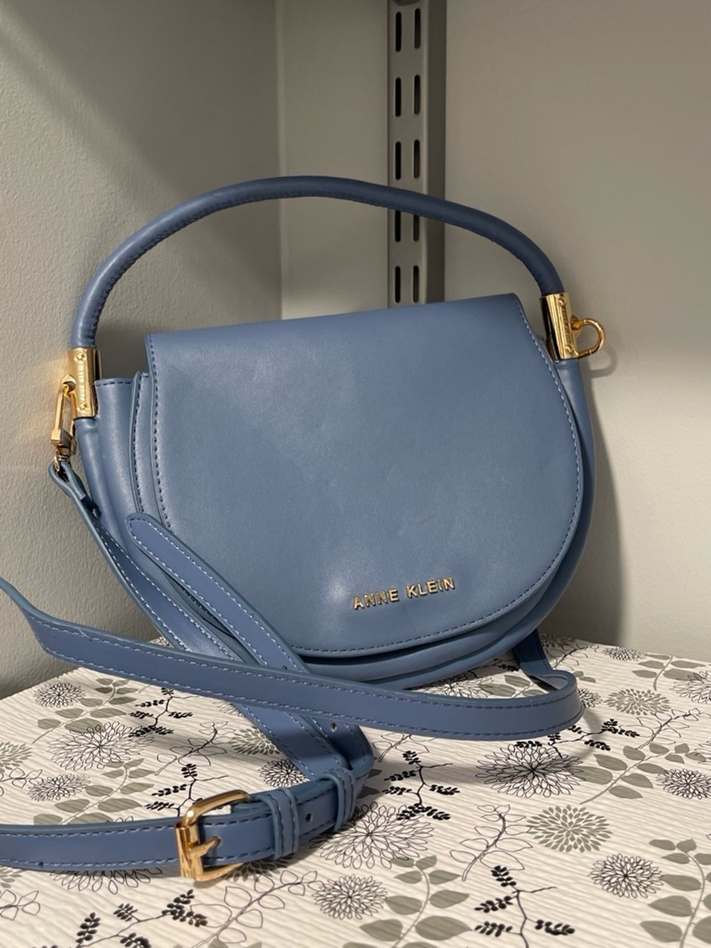 Anne Klein Dusty Blue Saddle Crossbody with Gold Hardware